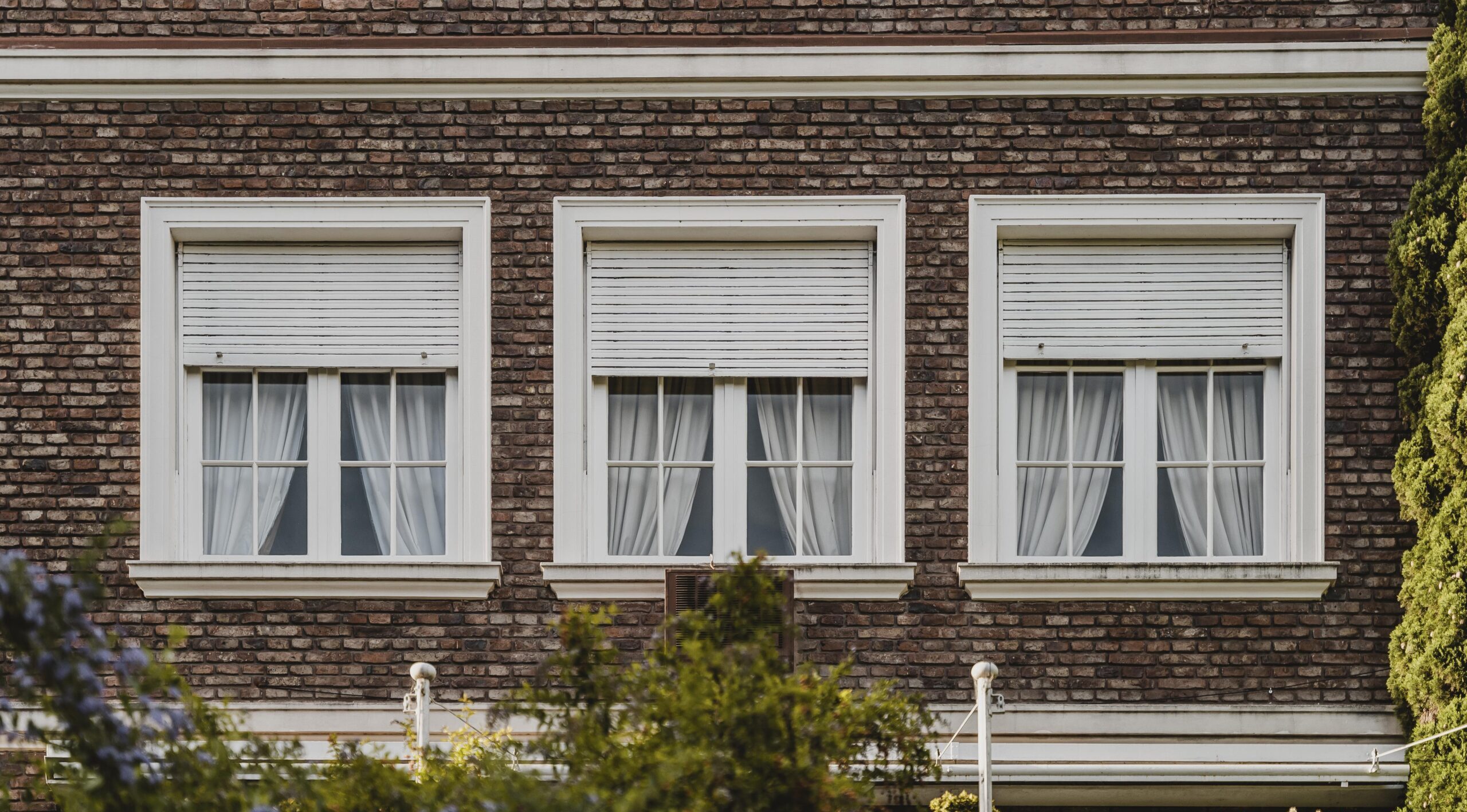 windows apartment building city scaled e1754732728734